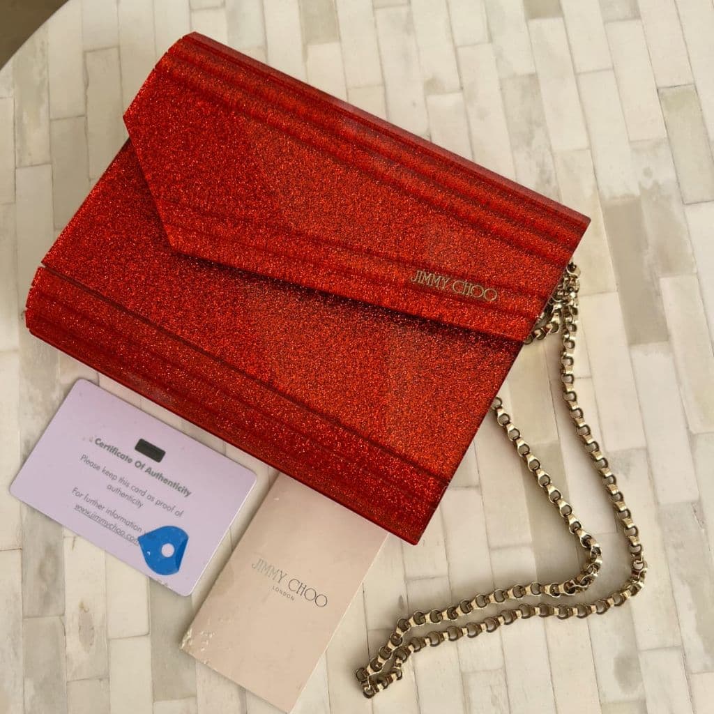 Jimmy Choo
Orange Acrylic and Leather Clutch